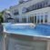 swimming pool with inflatables BY LARGE WHITE HOUSE